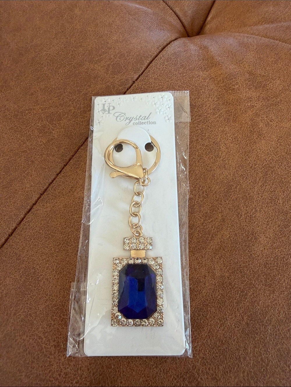 Gold Keychain/Bag Charm with Deep Blue Gem